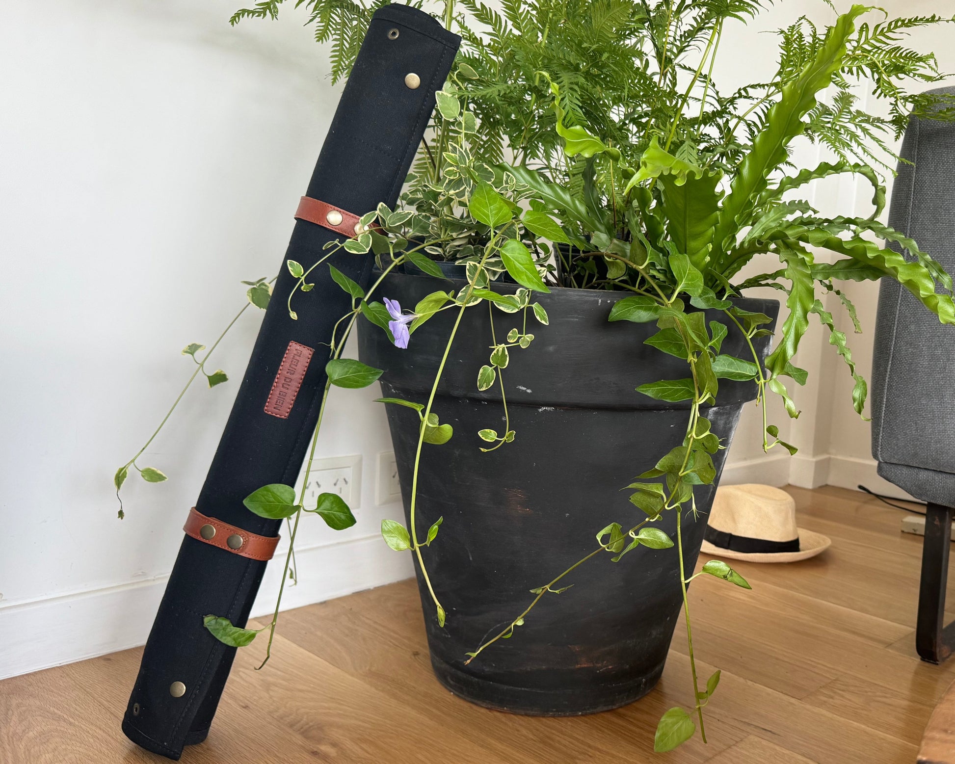 Foldable Fleur Du Bien Plant Repotting Mat neatly stored, saving space for small indoor apartments