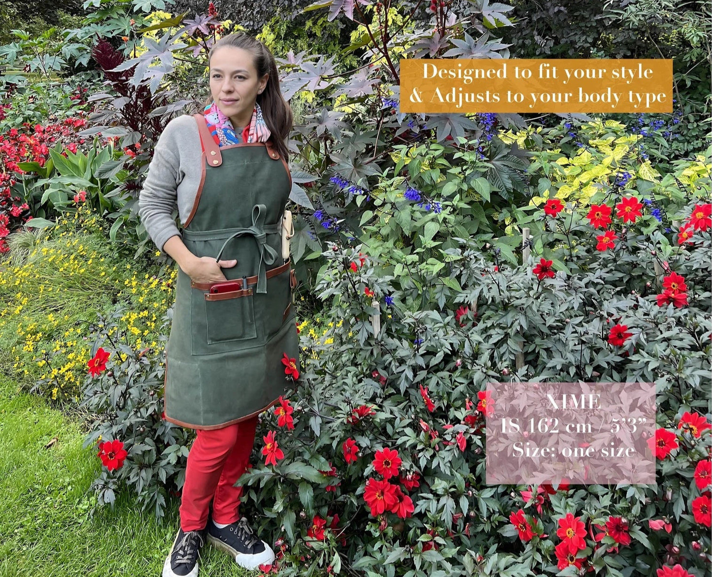 apron garden gardening garden hand tools outdoor garden
gardening accessories
plant repotting mat
gardening basket
gardening pots
Woman 1.62m tall wearing Fleur Du Bien apron in a luxury garden filled with red flowers and native plants, showing how the apron adjusts to her body type and complements her style