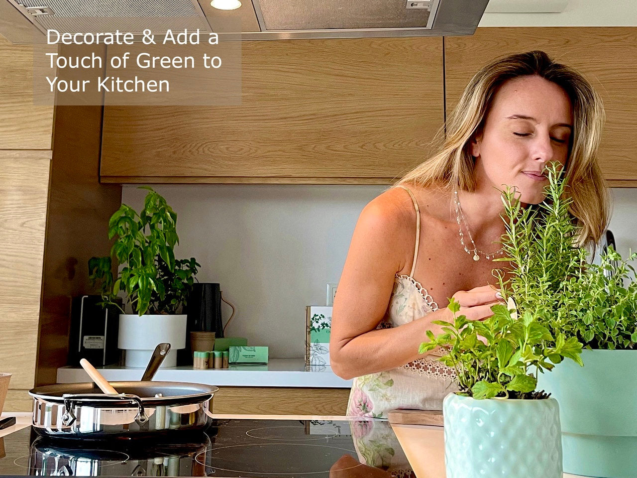 Grown herbs in biodegradable pots from Fleur Du Bien Indoor Herb Garden Starter Kit"