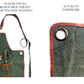 Close-up of Fleur Du Bien apron showing high-quality hardware and snap buttons, highlighting adjustable straps and durable eco-friendly design for gardening, BBQ, and DIY projects
