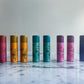 Fleur Du Bien DIY Lip Balm & Lip Gloss finished tubes, organic and natural ingredients, handmade design with colorful floral accents, eco-friendly and perfect as a gift