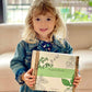 Kids planting herbs in Fleur Du Bien Indoor Herb Garden Starter Kit for educational DIY fun